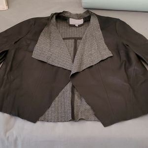 NWOT short leather jacket size L. Perfectly gorgeous